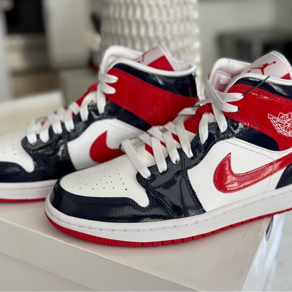 Jordan Youth Red, White, and Black Mid-Top Sneakers